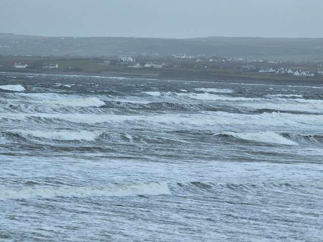 big swell blown out by strong onshore wind